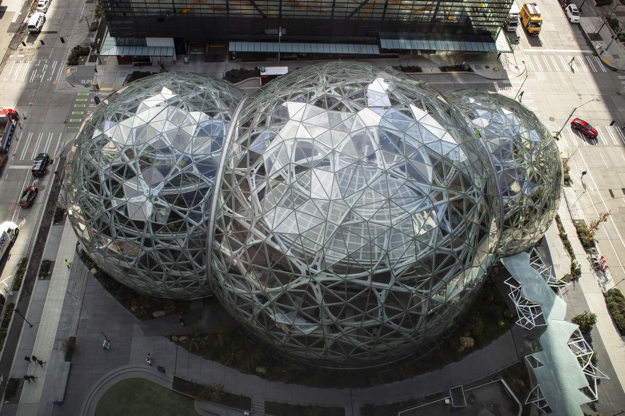 Amazon to pay quarantined staff sick leave, establishes 25 million USD relief fund for partners. Image via Vox.