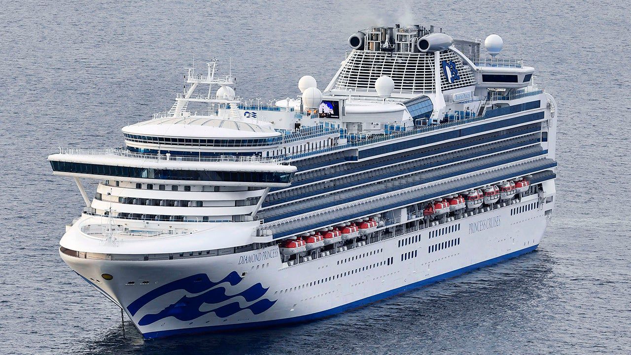Ten people aboard the ship have tested positive for the virus, image via AP