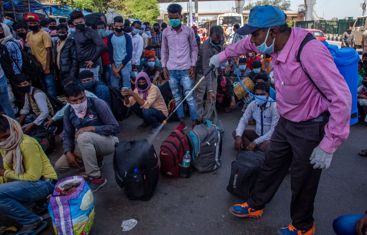 Indian migrant workers doused in a Chemical solution