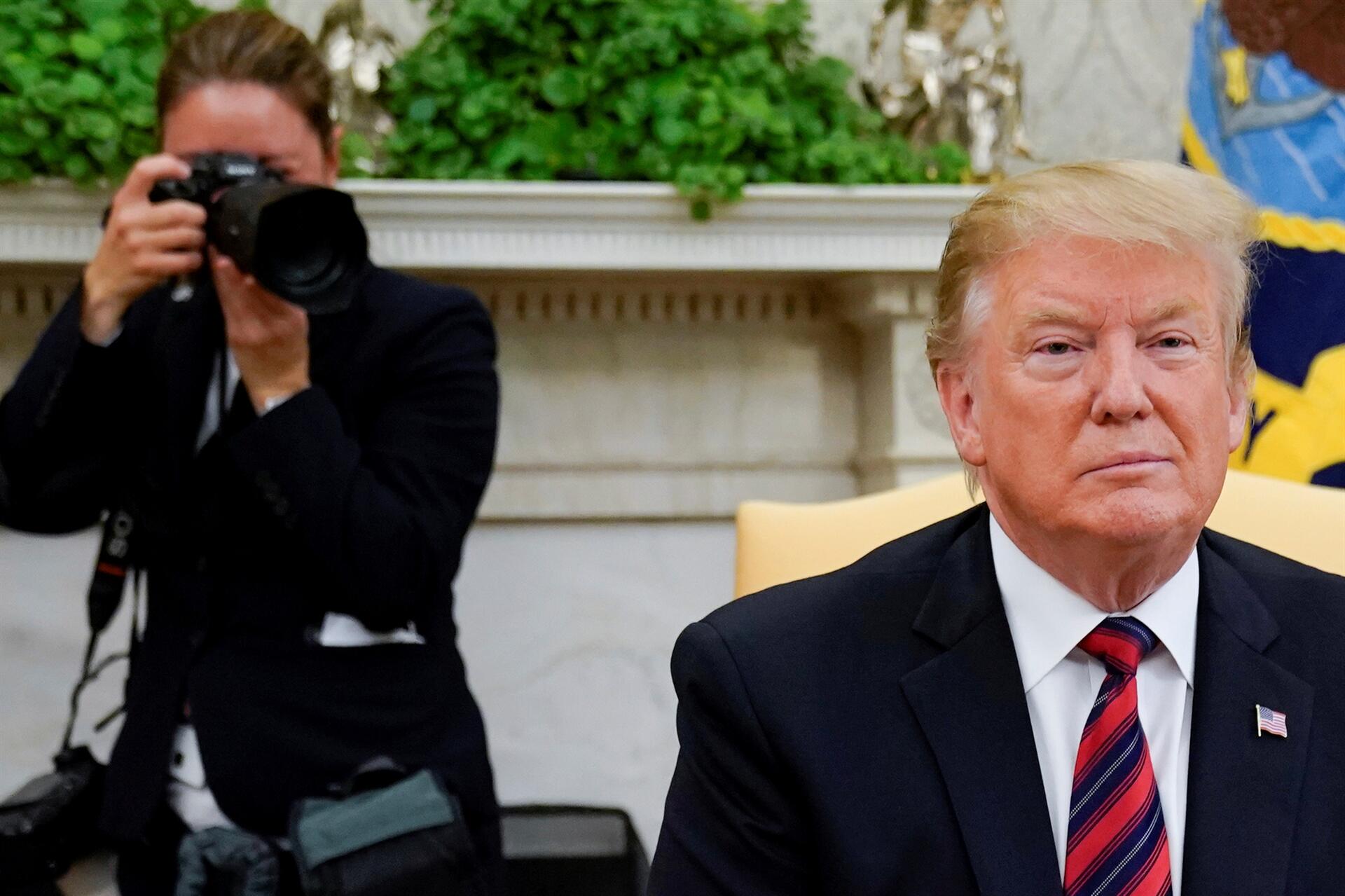 US-China trade war fears looms heavy over global markets. Image via Reuters.