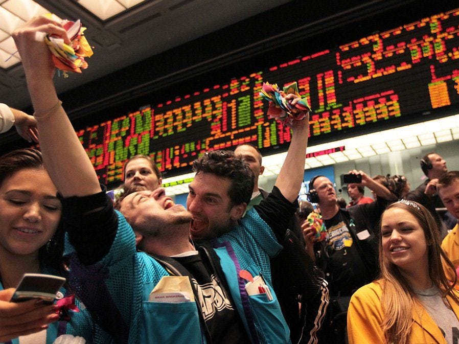 US stocks closed at a record high on Friday, on US-China trade deal hopes, Image via Getty Images