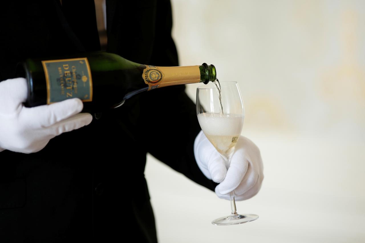 Trump considering retaliating to French tech tax with taxes on wine and cheese. Image via Reuters.