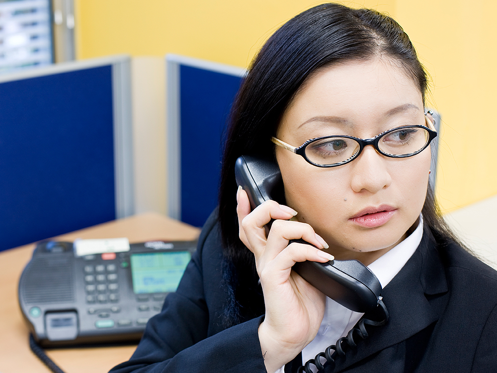 Some Japanese businesses said glasses-wearing shop assistants gave a "cold impression", image via Getty Images