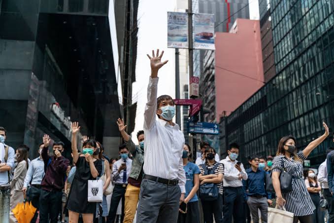 The man was hit on the head during a clash with the police, image via Time