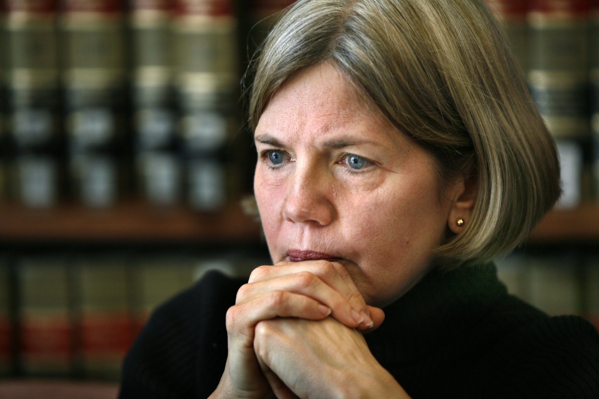 Native American petition Warren to apologize for past ancestry claims. Image via New York Times.