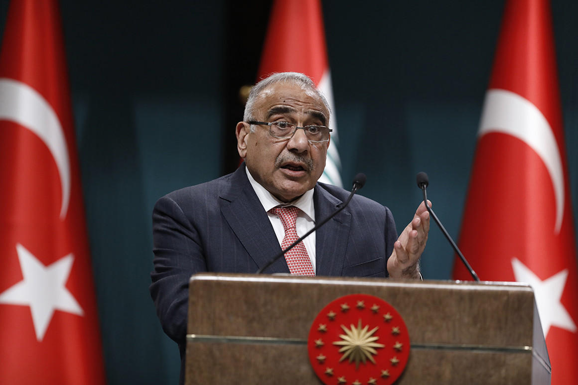 Iraqi PM, top officials resign amid protests. Image via AP.