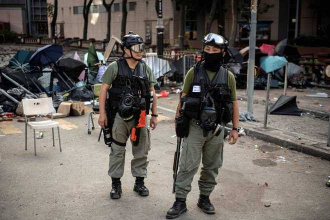 Police have not been able to find any of the protesters still hiding on campus, image via AFP